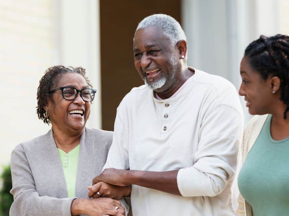 senior family and adult daughter spending time on a walk